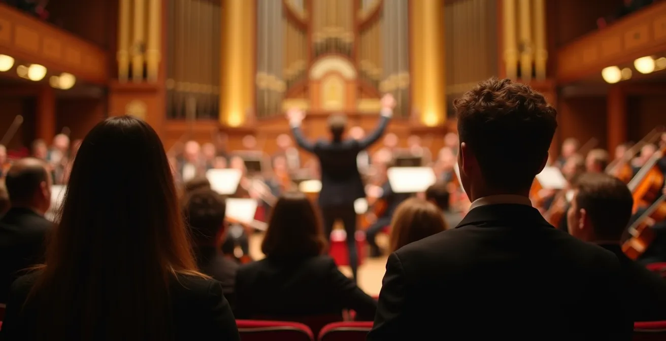 View from the Arena standing area showing musicians on stage at Royal Albert Hall